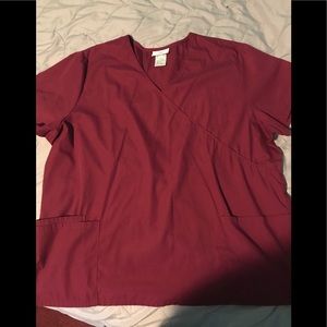 Woman’s burgundy scrub top